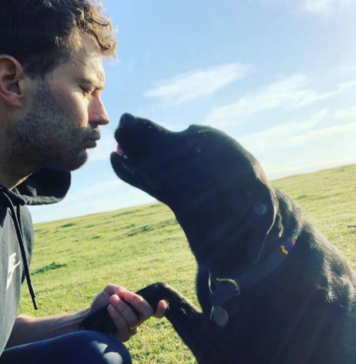 Alberta Dornan's father, Jamie Dornan, with their dog.